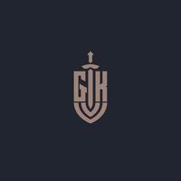 gk logo monogramma con spada e scudo stile design modello vettore