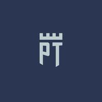 pt logo monogramma con fortezza castello e scudo stile design vettore