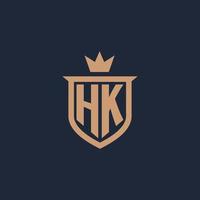 HK monogramma iniziale logo con scudo e corona stile vettore