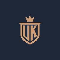 UK monogramma iniziale logo con scudo e corona stile vettore