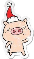 cartone animato adesivo in difficoltà di un maiale contenuto che indossa il cappello di Babbo Natale vettore