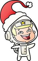 cartone animato sfumato di un astronauta che ride che indossa il cappello di Babbo Natale vettore