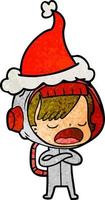cartone animato testurizzato di una donna astronauta che spiega indossando il cappello di Babbo Natale vettore