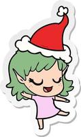 cartone animato adesivo felice di una ragazza elfo che indossa il cappello di Babbo Natale vettore