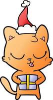 simpatico cartone animato sfumato di un gatto che indossa il cappello di Babbo Natale vettore
