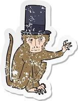 adesivo retrò in difficoltà di una scimmia cartone animato che indossa un cappello a cilindro vettore