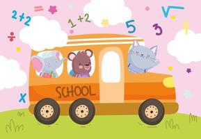 animali felici sullo scuolabus vettore
