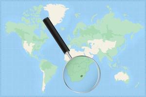 carta geografica di il mondo con un' ingrandimento bicchiere su un' carta geografica di lesotho. vettore