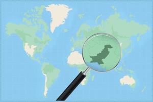 carta geografica di il mondo con un' ingrandimento bicchiere su un' carta geografica di Pakistan. vettore