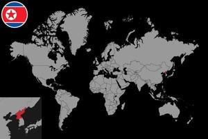 mappa pin con la bandiera della corea del nord sulla mappa del mondo. illustrazione vettoriale. vettore