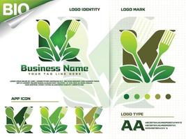 salutare cibo lettera K logo design con creativo verde foglia vettore