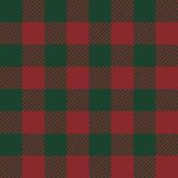 tartan verificato plaid rosso e verde colori. senza soluzione di continuità tessuto struttura Natale tema colori sfondo. vettore