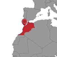 mappa pin con bandiera marocco sulla mappa del mondo. illustrazione vettoriale. vettore