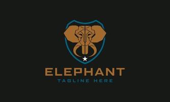 elefante testa nel scudo logo design. vettore illustrazione di un elefante con moderno stile. elefante icona design modello.