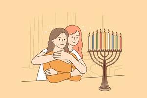 festeggiare santo hanukkah vacanza concetto. Due contento ebraico sorelle seduta abbracciare guardare a bellissimo menorah candelabri raggiante su otto giorno di hanukkah ebraico vacanza vettore illustrazione