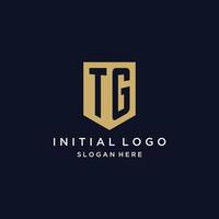tg monogramma iniziali logo design con scudo icona vettore