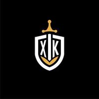 creativo lettera xk logo gioco esport con scudo e spada design idee vettore