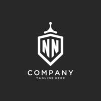 nn monogramma logo iniziale con scudo guardia forma design vettore