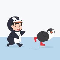 personaggi del bambino in costume da pinguino che pattina sul ghiaccio vettore