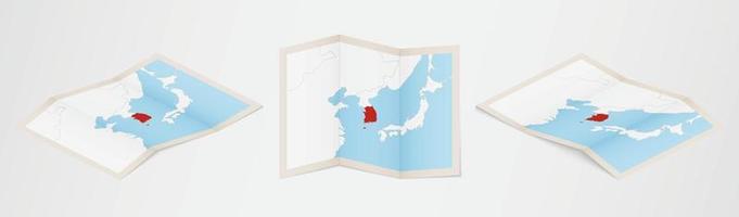 piegato carta geografica di Sud Corea nel tre diverso versioni. vettore
