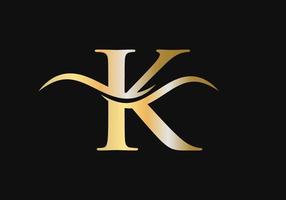 lettera K logo design con acqua onda concetto vettore
