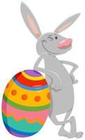 coniglietto di Pasqua del fumetto con grande uovo colorato vettore