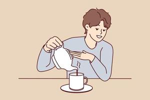 giovane uomo sedersi a scrivania scrosciante tè nel tazza a partire dal bollitore. sorridente tipo godere caldo caffè nel boccale a casa. vettore illustrazione.