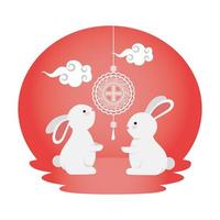 simpatici e piccoli conigli con lampade cinesi appese vettore