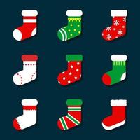 set di icone calze di Natale simpatico cartone animato vettore
