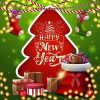 felice anno nuovo, biglietto di auguri quadrato rosso e verde con albero di Natale ritagliato di carta, calze natalizie e borsa rossa di Babbo Natale con regali vettore