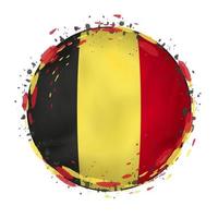 il giro grunge bandiera di Belgio con spruzzi nel bandiera colore. vettore
