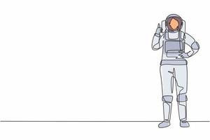 l'astronauta femminile del disegno a linea continua singola si leva in piedi con il gesto del pollice in su indossando una tuta spaziale esplorando la terra, la luna, altri pianeti nell'universo. una linea disegnare grafica vettoriale illustrazione