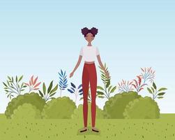 giovane donna afro in piedi nel campo vettore