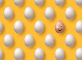 sorriso marrone realistico uova di Pasqua emoji su sfondo giallo. modello senza soluzione di continuità. collezione di pasqua. illustrazione vettoriale. vettore