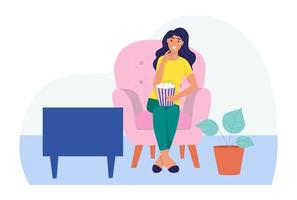 una giovane donna è seduta sul divano, guarda la tv e mangia popcorn. il concetto di vita quotidiana, tempo libero quotidiano e attività lavorative. illustrazione vettoriale di cartone animato piatto.