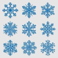collezione di icone di fiocco di neve blu isolato su priorità bassa bianca. vettore