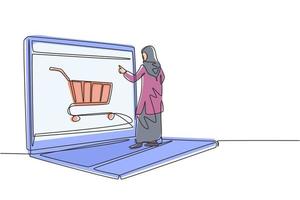 disegno a linea continua di una giovane donna araba che fa shopping attraverso lo schermo del laptop con il carrello della spesa. e-commerce, concetto di stile di vita digitale. illustrazione vettoriale di disegno grafico di disegno grafico di una linea dinamica