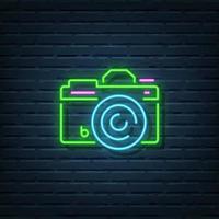 insegna al neon della fotocamera vettore