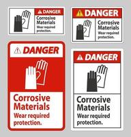 segnale di pericolo materiali corrosivi indossare la protezione richiesta vettore