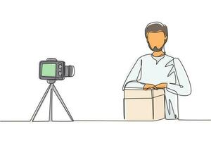 unboxing di un vlogger maschio arabo di disegno a una linea, recensione del prodotto dal vivo su youtube in studio. social media influencer che registra video di unboxing a casa. illustrazione vettoriale di disegno a linea continua