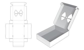scatola pieghevole in latta con modello fustellato a forma di fiocco vettore