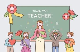 evento di ringraziamento commemorativo del giorno dell'insegnante e giovani studenti e insegnanti sono in piedi davanti alla lavagna con in mano dei fiori vettore