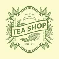 mano disegnato tè negozio logo design con illustrazione di tè le foglie su Vintage ▾ emblema francobollo vettore