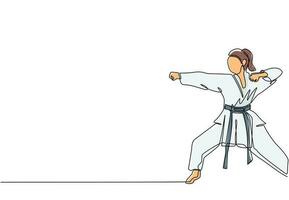 disegno continuo di una linea giovane donna sicura di karateka in kimono che pratica il combattimento di pugni di karate al centro della palestra dojo. padroneggiare il concetto di sport di arte marziale. illustrazione vettoriale di disegno a linea singola