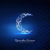 Bello ramadan kareem della carta con il fondo brillante della luna blu vettore