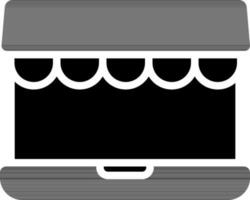 glifo illustrazione di in linea negozio nel il computer portatile icona. vettore