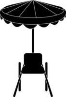 ombrello icona con sedia per seduta concetto nel nero. vettore
