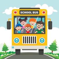 bambini felici e scuolabus vettore