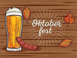 celebrazione del festival dell'oktoberfest con bicchiere di birra, salvia, foglie autunnali sullo sfondo di legno vettore