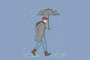 uomo nel stivali e capispalla a piedi nel pioggia sotto ombrello. tipo su su piovoso giorno. tempo metereologico e clima modificare. vettore illustrazione.